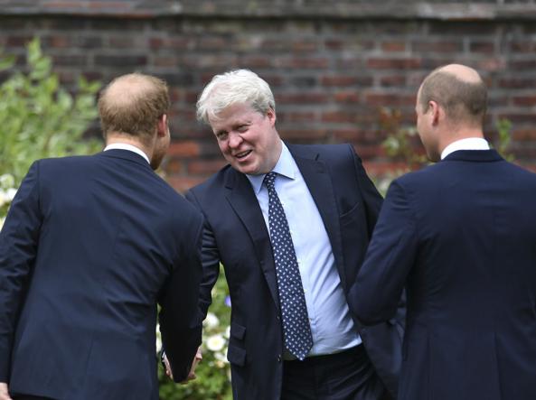 Earl Spencer in the middle between Harry and William (AFP)