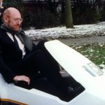 Sir Clive Sinclair demonstrates his battery-assisted pedal powered tricycle at Alexandra Palace, London, in 1985