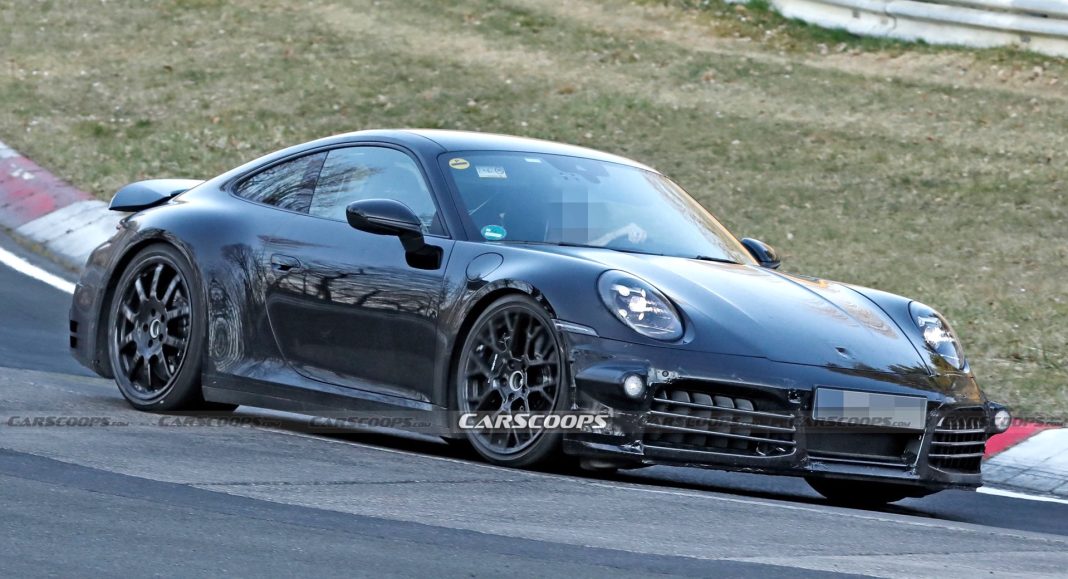 An electrified Porsche 911 Hybrid 2024 caught charging hard at the Nürburgring

