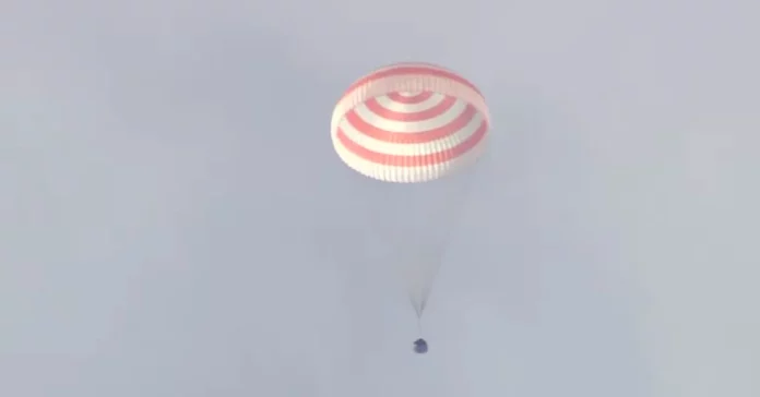 The Soyuz spacecraft landed, and a Russian and an American cosmonaut returned to Earth.

