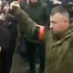 Ukraine, Russian soldier walking with two hand grenades, demanding surrender, crowd insults him: 'Shame'

