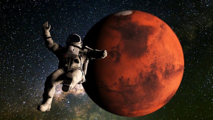 SpaceX COO Elon Musk says manned missions will reach Mars by 2030. NASA says otherwise

